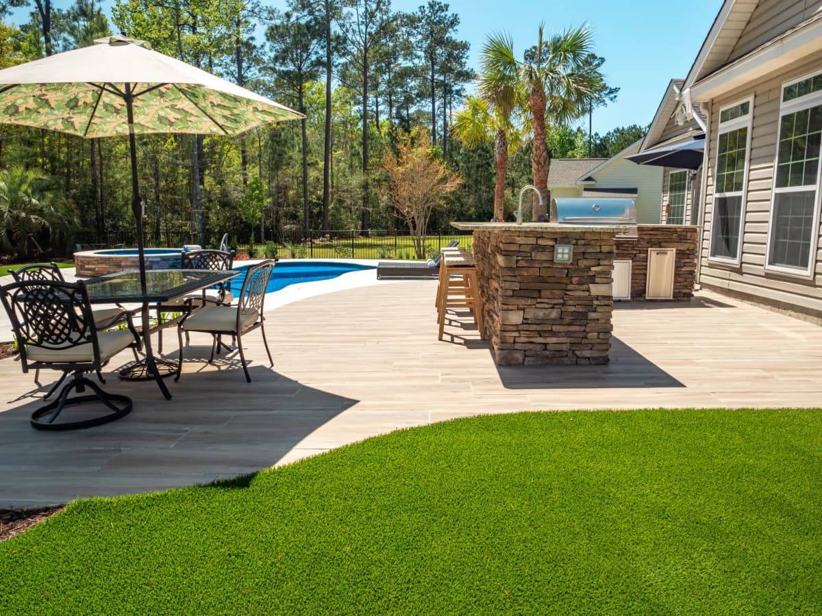 Poolside Outdoor Kitchen Dining River Pools — Aquarius Pools & Spas