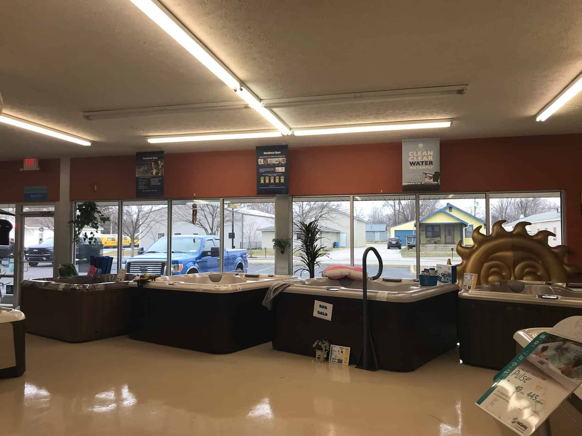 Aquarius retail store aisles stocked with pool supplies